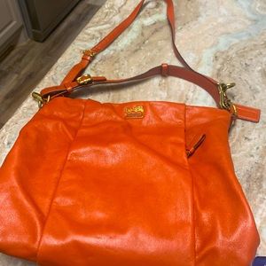 Orange soft leather Coach hobo bag